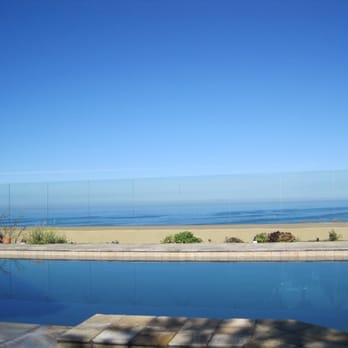 Advanced Glass Walls - The new glass wall nearly disappears in the view. - Masonry/Concrete Near Me