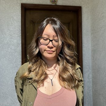 Lovely's Salon - Outdoor picture with my newly toned hair (golden and brown streaks in sunlight), front face view - Hair Salons Near Me - Garden Grove, California Lovely's Salon - Outdoor picture with my newly toned hair (golden and brown streaks in sunlight), front face view - Hair Salons Near Me - Garden Grove, California