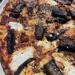 Salvatore's Pizzaiola Trattoria - Original pizza with roasted portobello mushrooms, hot Italian sausage and ricotta cheese.