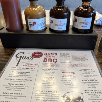 Gus's BBQ - Available BBQ sauces on the Table - Barbeque Near Me - Porter Ranch, California