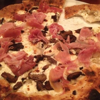 Roostica - Truffle and mushroom white pizza with pruchetto - Italian Near Me - Key West, Florida Roostica - Truffle and mushroom white pizza with pruchetto - Italian Near Me - Key West, Florida