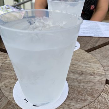 Bar 51 - a woman sitting at a table with a glass of water - Wine Bars Near Me - Birmingham, Alabama
