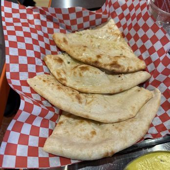 Sizzling Indian Kitchen - Garlic naan ( bread) - Indian Near Me - Happy Valley, Oregon Sizzling Indian Kitchen - Garlic naan ( bread) - Indian Near Me - Happy Valley, Oregon