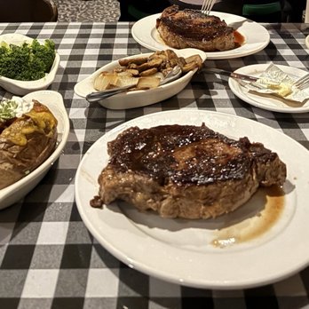 Linda's La Cantina - Ribeyes, half onion half mushroom, broccoli, and very empty French Onion Soup bowl - Steakhouses Near Me - Orlando, Florida