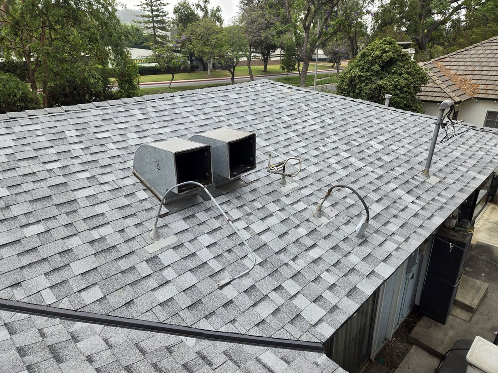 Slide of Musulman Roofing