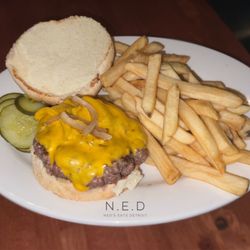 Irish Coffee Bar & Grill - 1/3lb Ground Round Deluxe with American Cheese and Sautéed Onions
