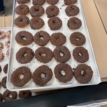 Duck Donuts - Corporate order waiting to be packaged - Donuts Near Me - Green Brook Township, New Jersey Duck Donuts - Corporate order waiting to be packaged - Donuts Near Me - Green Brook Township, New Jersey