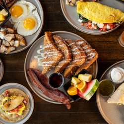 Weekend brunch at Water Street Brewery featuring French toast, breakfast burritos, eggs, omelets, bacon, potatoes, and fresh fruit.