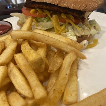 Cured Table & Tap - Mahi mahi sandwich with paprika seasoned fries - American Near Me - Columbia, Maryland