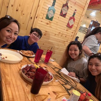 Swamp Daddy's - Family excited that the crawfish was out for sharing. - Seafood Markets Near Me - Alexandria, Louisiana