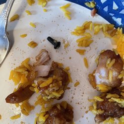 Main Moon Chinese Restaurant - A metal screw found inside our General Tso's...discovered deep in the breading of the chicken.