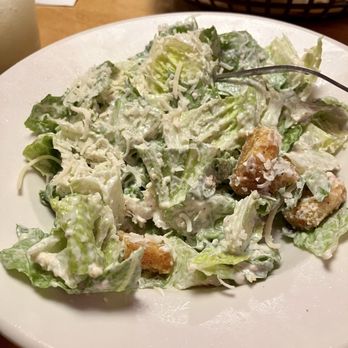 Texas Roadhouse - Side of Caesar salad drenched with dressing. Forgot to ask for it on the side - Steakhouses Near Me - Marlton, New Jersey