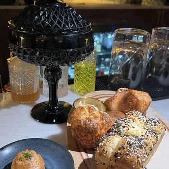 14 Prime - Complimentary bread with the most amazing miso butter.  Complimentary mushroom puff. - Steakhouses Near Me - Jacksonville, Florida