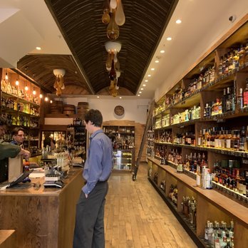 Cask - a man standing at a counter in a liquor store - Beer, Wine & Spirits Near Me - San Francisco, California Cask - a man standing at a counter in a liquor store - Beer, Wine & Spirits Near Me - San Francisco, California
