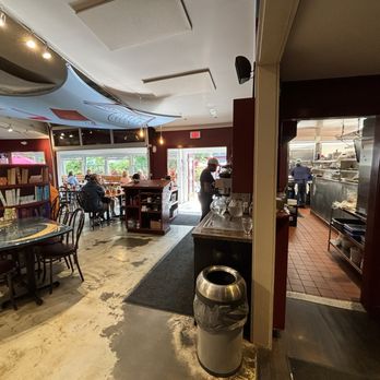 Cafe This Way - Indoor dining area facing the entrance with the kitchen around the corner - New American Near Me - Bar Harbor, Maine