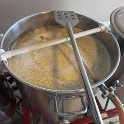 Duck Creek Vineyard and Winery - Mashing grains