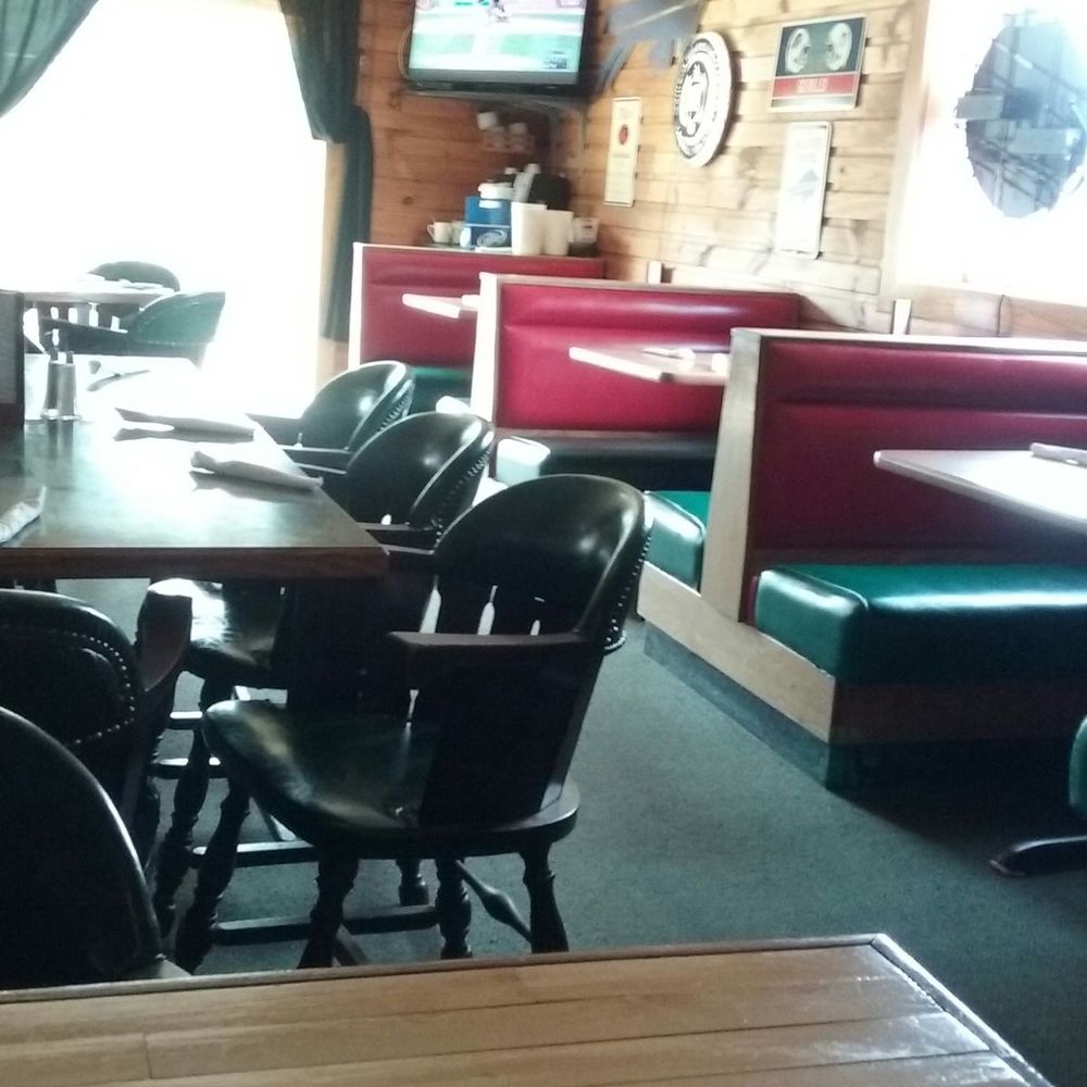 MJ's Tavern - Booths, tables,  and back deck doors - Bars Near Me - Randolph, New York