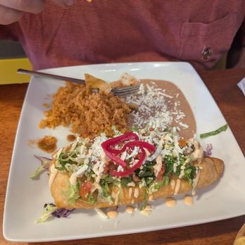 Catrina Tacos & Tequila - Chimichanga. Accompanied by a smear of tasteless beans and hard stale 'Spanish' rice. - Mexican Near Me - Mount Vernon, Washington