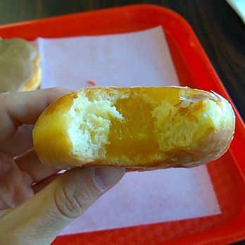 Evergreen Donuts - Close up of a lemon filled donut - Donuts Near Me - Lynnwood, Washington