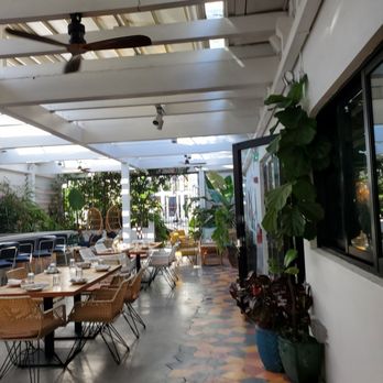 Red Rooster Overtown - Open air outdoor seating - Cocktail Bars Near Me - Miami, Florida Red Rooster Overtown - Open air outdoor seating - Cocktail Bars Near Me - Miami, Florida