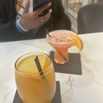 Seven Bistro - Hennessy and Sunshine in front, Spring Fling (rum based) in back - Breakfast & Brunch Near Me - Newport News, Virginia Seven Bistro - Hennessy and Sunshine in front, Spring Fling (rum based) in back - Breakfast & Brunch Near Me - Newport News, Virginia