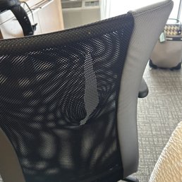 Welcomed with a torn desk chair.