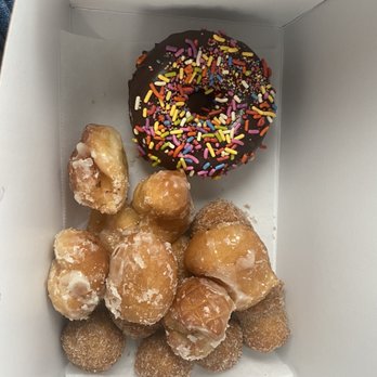 Holey Rollers - Chocolate sprinkle donut with some glazed and cinnamon sugar holes - Donuts Near Me - Oklahoma City, Oklahoma
