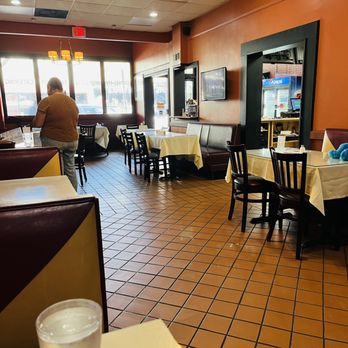 Norwood Spice - a restaurant with tables and chairs - Indian Near Me - Norwood, Massachusetts Norwood Spice - a restaurant with tables and chairs - Indian Near Me - Norwood, Massachusetts