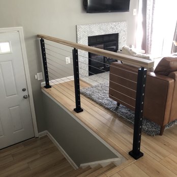 Traylor Design & Construction - Railing and flooring - General Contractors Near Me