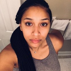 Black Pearls Beauty Salon - Loved my hair, I wasn't able to get a good picture of it, but I did three layer cornrows ending with  braids down to my back.
