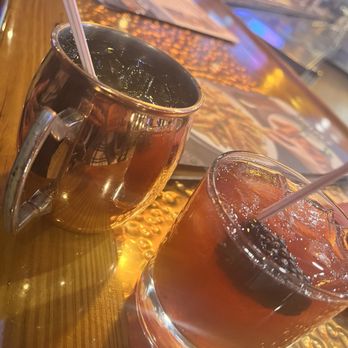 Miller's Ale House - Grey Goose Mule & BlackBerry bourbon smash - Sports Bars Near Me - Lombard, Illinois