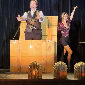 Intrigue Theater - She's locked in the box, then after a curtain drop, she appears, unlocks the box, and he pops up! - Performing Arts Near Me - Eureka Springs, Arkansas Intrigue Theater - She's locked in the box, then after a curtain drop, she appears, unlocks the box, and he pops up! - Performing Arts Near Me - Eureka Springs, Arkansas