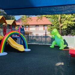 Pickwick School - Our playground filled with sprinklers and water tables for summer fun!