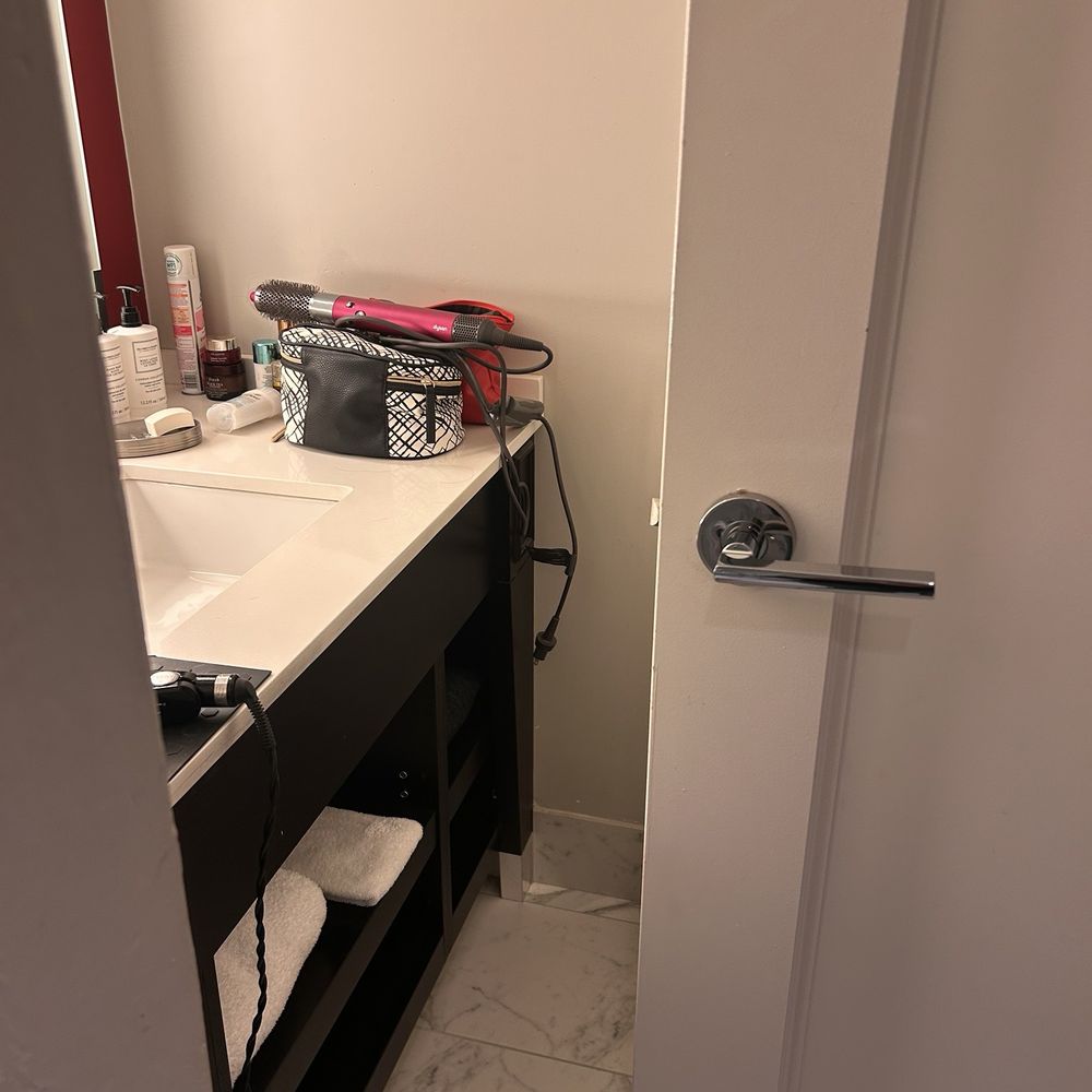 Weird bathroom. Room is so limited because of the door. A pocket door would have been better for this space Weird bathroom. Room is so limited because of the door. A pocket door would have been better for this space