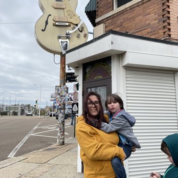 Sun Studio - Me holding my son and my other son in the corner outside Sun Studio. - Museums Near Me - Memphis, Tennessee Sun Studio - Me holding my son and my other son in the corner outside Sun Studio. - Museums Near Me - Memphis, Tennessee