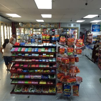 Korner Market - a woman shopping in a grocery store - Grocery Near Me - Escondido, California