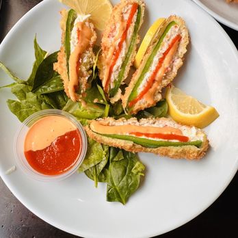 Sushi Kuchi - a plate of food on a table - Sushi Bars Near Me - San Diego, California