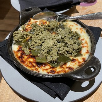 Maximón - Queso fundido with green chorizo - Latin American Near Me - Baltimore, Maryland Maximón - Queso fundido with green chorizo - Latin American Near Me - Baltimore, Maryland