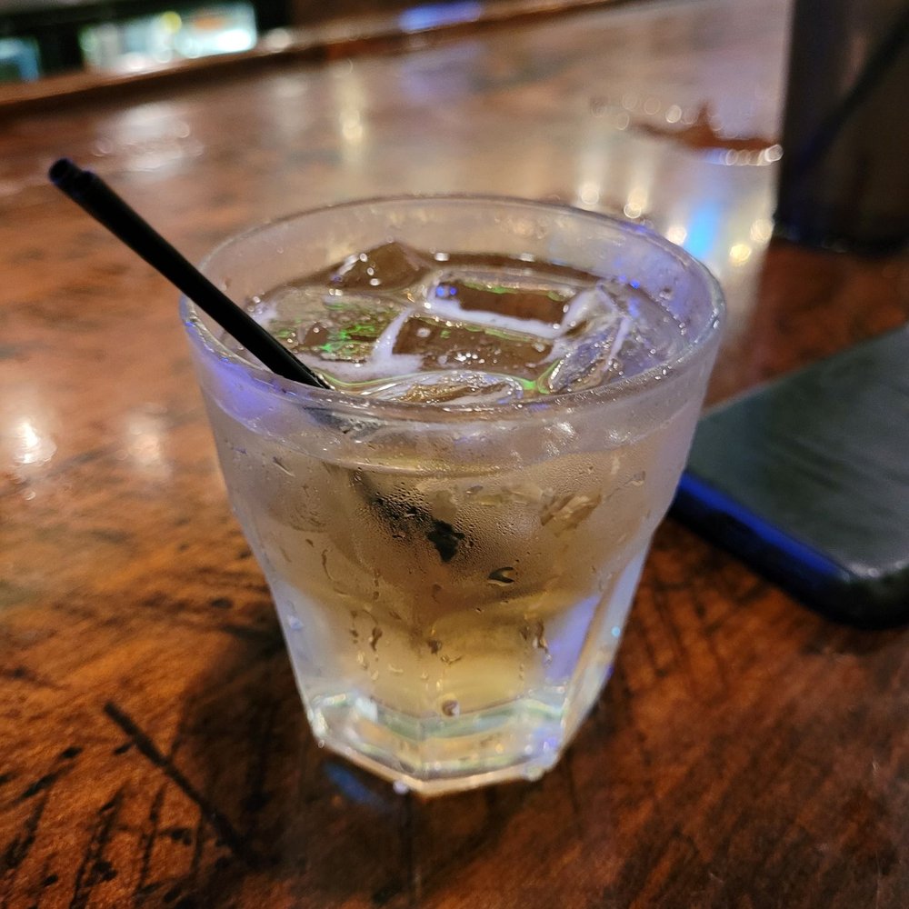 Old Courthouse Tavern - a drink in a glass with a straw - New American Near Me - Fayetteville, Georgia