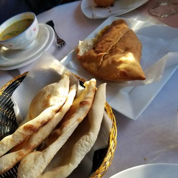 Ashoka Grill - Rasam (a lentil soup), Naan, Aloo Paratha, and Banana Pakora (fritters) - Indian Near Me - Brooklyn, New York Ashoka Grill - Rasam (a lentil soup), Naan, Aloo Paratha, and Banana Pakora (fritters) - Indian Near Me - Brooklyn, New York