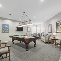 Town Village - Well lit pool table at Town Village