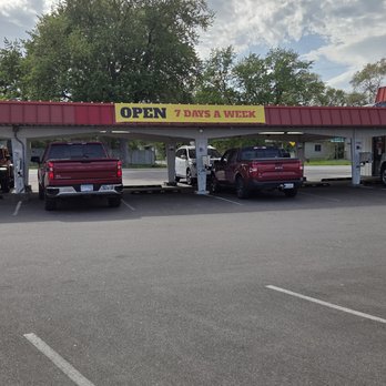 Wagner's Drive-In - Order from the speaker next to each parking spot and they deliver it to your car. - Burgers Near Me - Brooklyn Park, Minnesota Wagner's Drive-In - Order from the speaker next to each parking spot and they deliver it to your car. - Burgers Near Me - Brooklyn Park, Minnesota