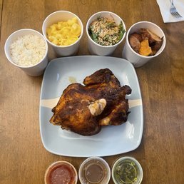 While roasted chicken, 4 sides, 3 sauces While roasted chicken, 4 sides, 3 sauces