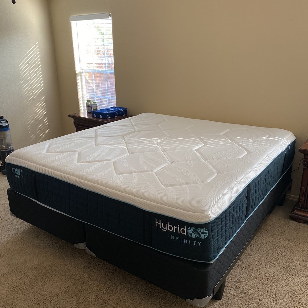 King size Hybrid Infinity Luxury bed with new box springs on recycled railroad steel frame