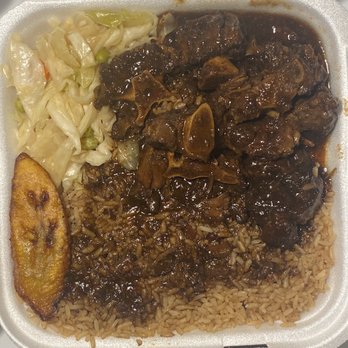 Caribbean Delight - Jamaican Grill Ox tail, rice and peas, plantain, and cabbage. - Caribbean Near Me - North Charleston, South Carolina