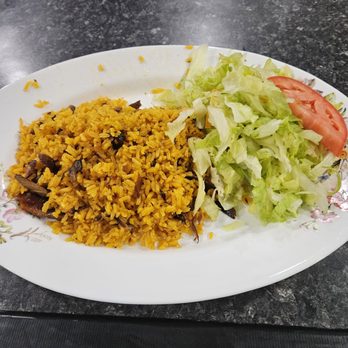 Cevicos Restaurant - a plate of food on a table - Dominican Near Me - New York, New York Cevicos Restaurant - a plate of food on a table - Dominican Near Me - New York, New York