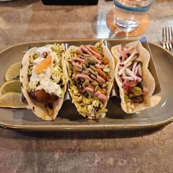 Fidel’s Cocina & Bar - Soft tacos L-R (Bomb Ass Fish, Cauliflower, Oaxacan with flank steak) - New Mexican Cuisine Near Me - Palisade, Colorado Fidel’s Cocina & Bar - Soft tacos L-R (Bomb Ass Fish, Cauliflower, Oaxacan with flank steak) - New Mexican Cuisine Near Me - Palisade, Colorado