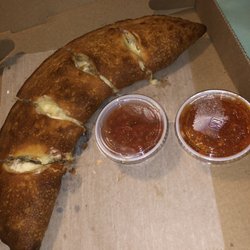 Sal's NY Pizza - Sausage and pepperoni calzone with extra sauce!