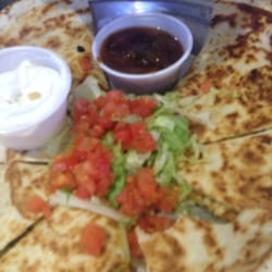 Island Sports Bar - Good quesadillas, great bar to watch sports. Smoking allowed.