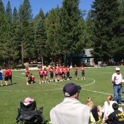Two Rivers Soccer Camp - Closing ceremony with counselors in red and trainers in blue